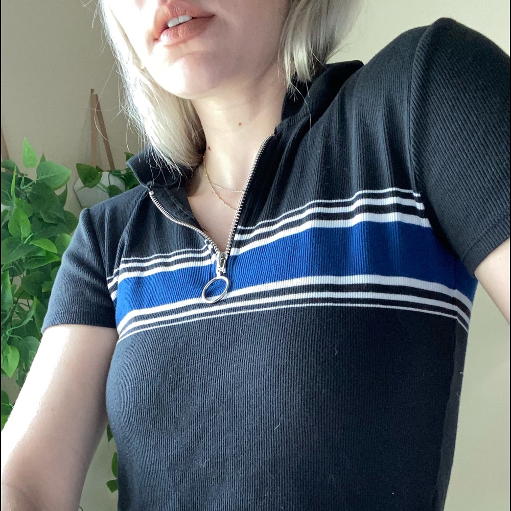 Black shirt w/ blue stripe. pac sun/size small